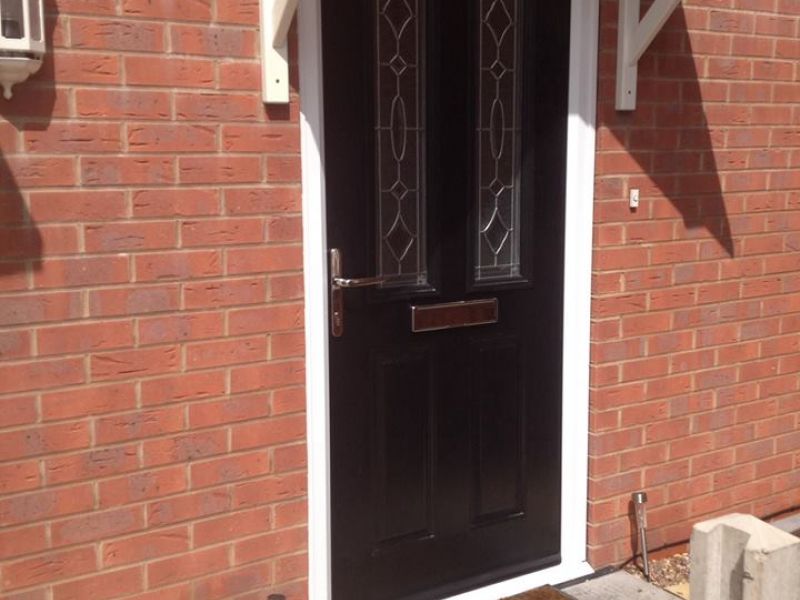 Black composite door with triple glazed and bevelled glass: Swipe To View More Images