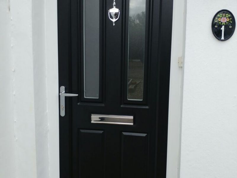 Upvc black door with white outer frame made to mimic a composite door: Swipe To View More Images